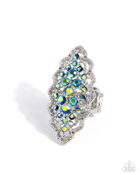 Silver hair clip with multicolored gemstones on a white background