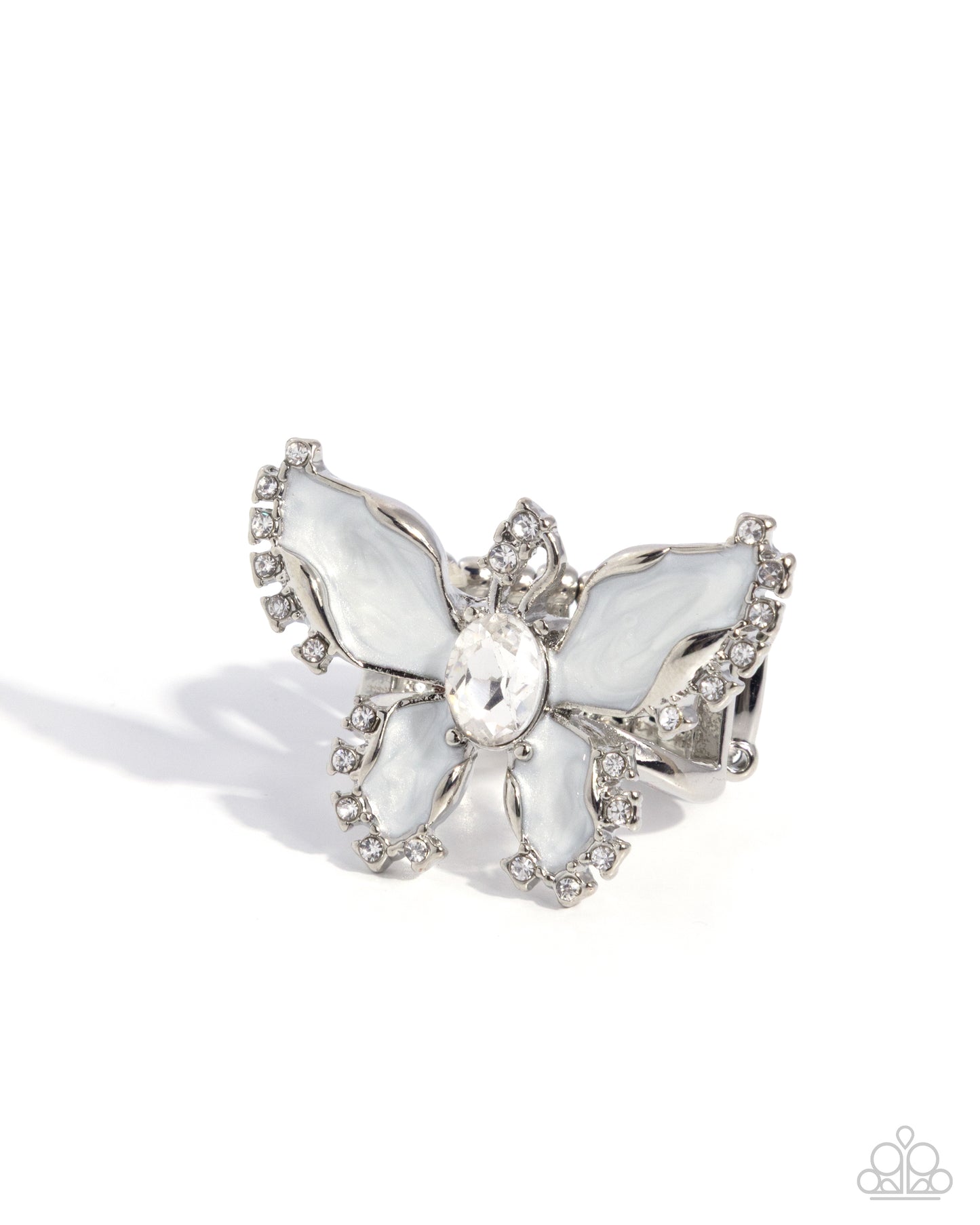 Silver butterfly brooch with gemstones on a white background