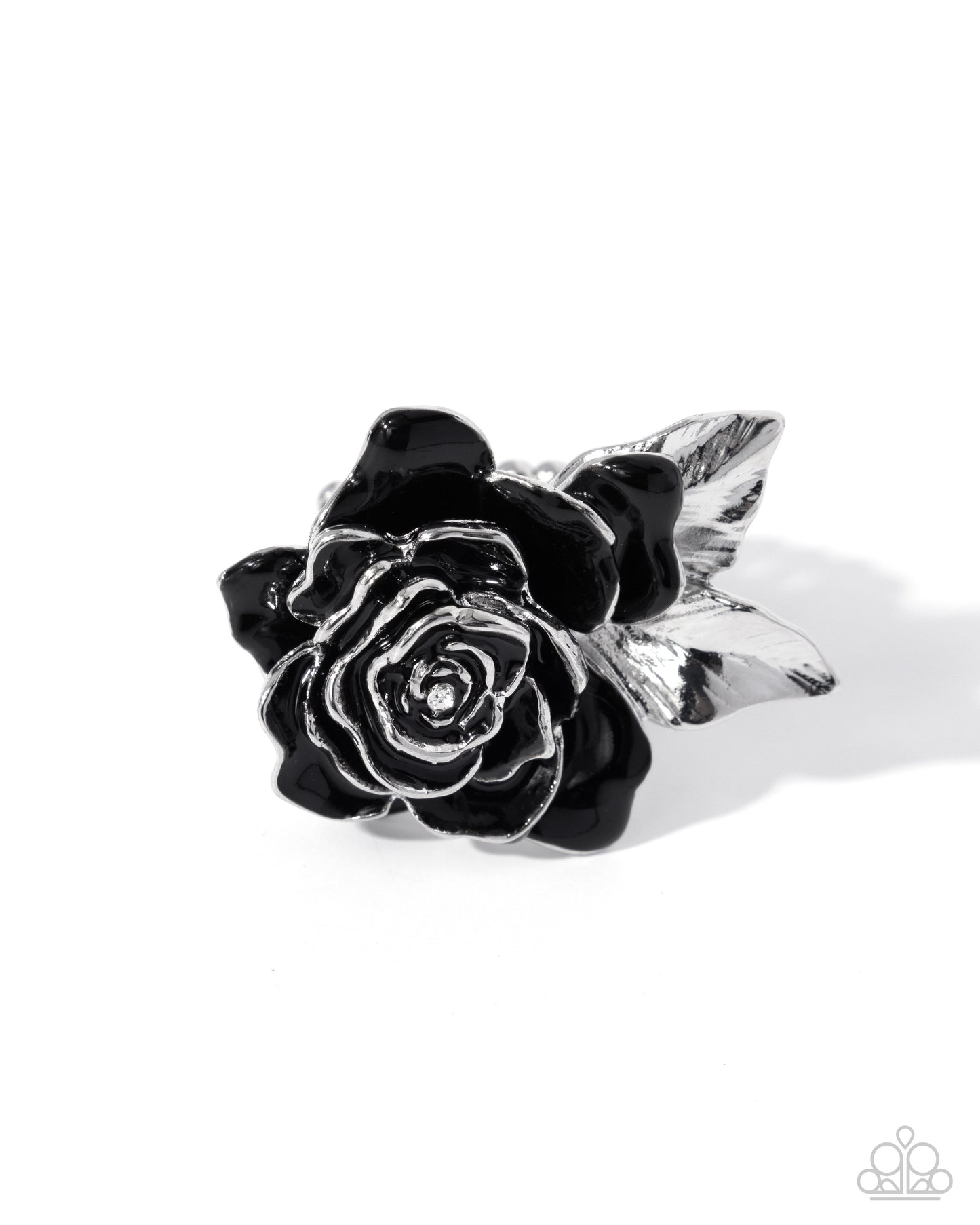 Silver ring with black rose design on a white background