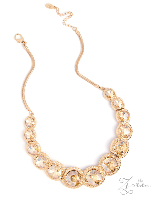 A gold-plated statement collar necklace featuring a graduated row of clear faceted round crystals in textured bezel settings, suspended from a slim gold chain with an adjustable extender clasp, shown on a white background.