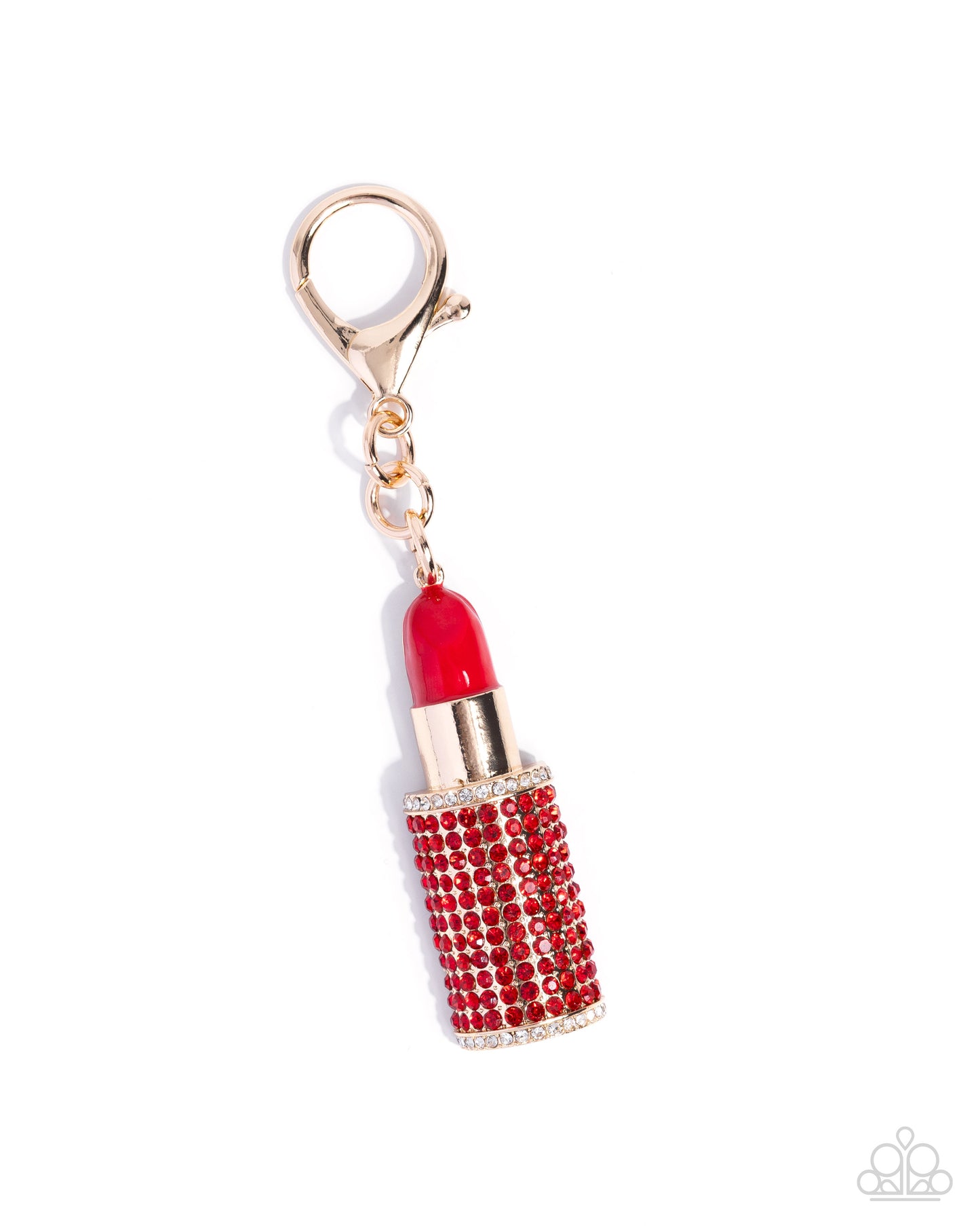 Red lipstick-shaped keychain with gold accents on a white background