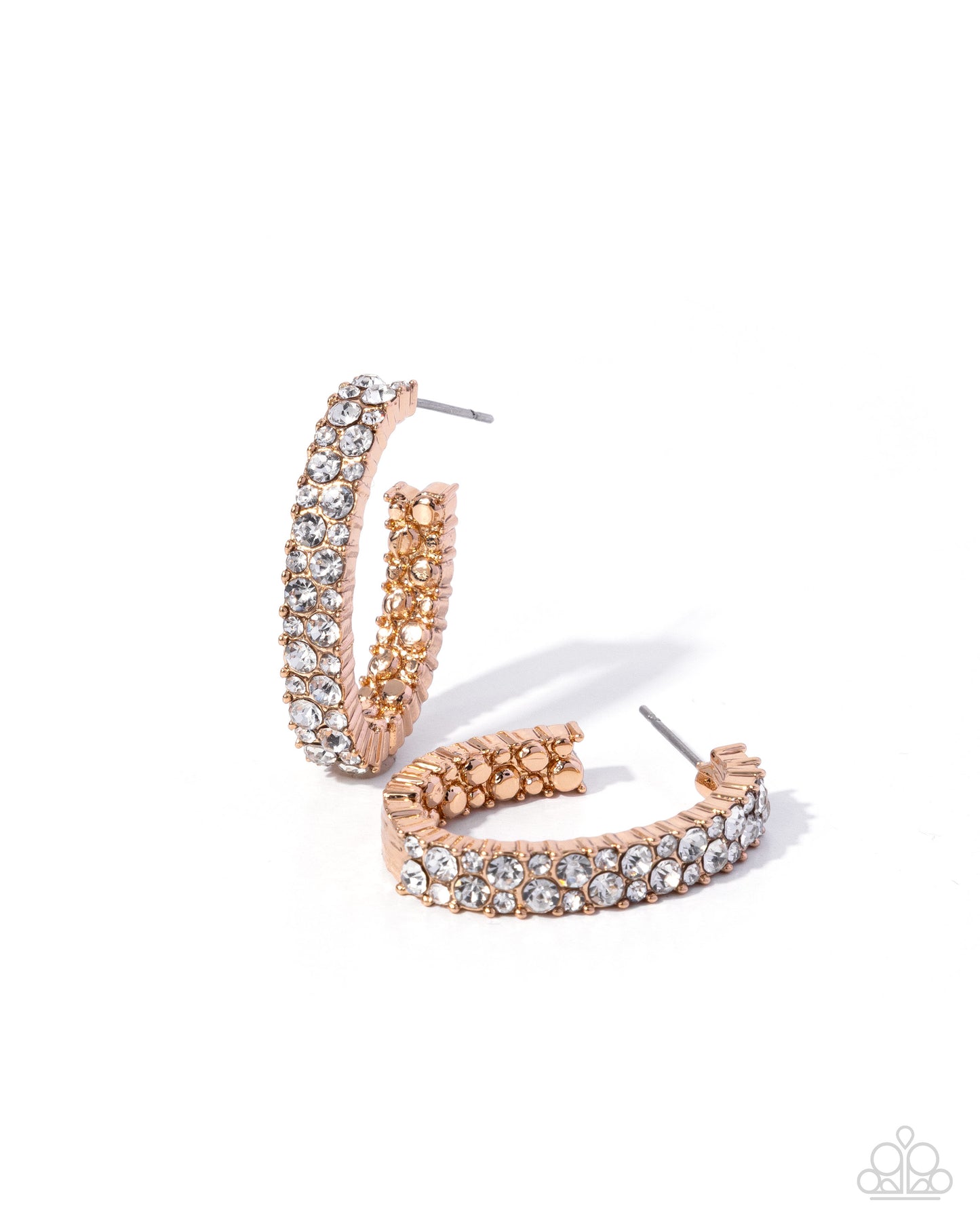 Rose gold hoop earrings with clear gemstones on a white background