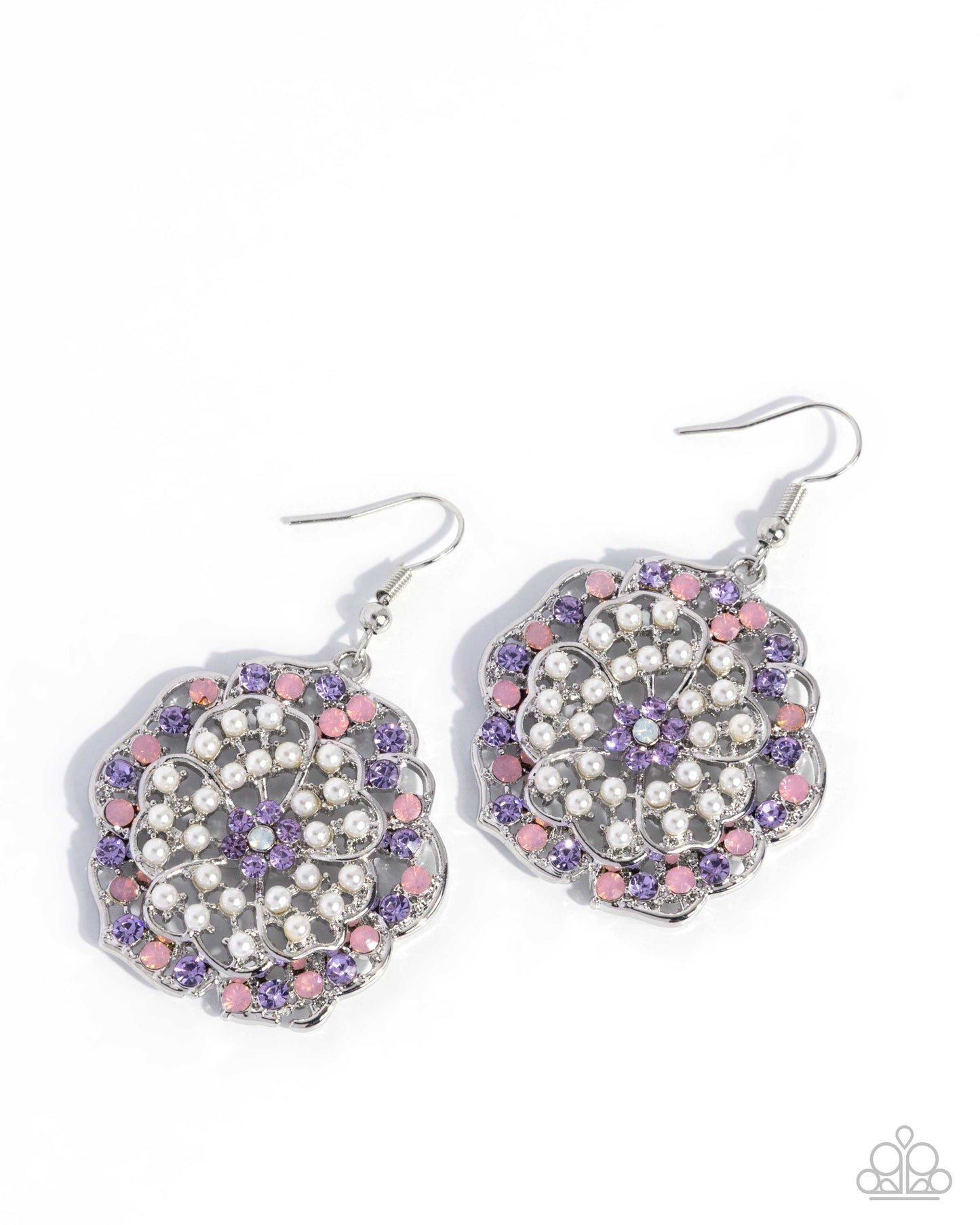 Pair of earrings with purple, pink, and white gemstones on a white background