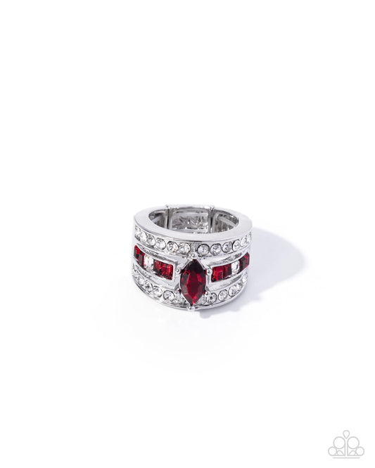 Silver ring with red gemstones on a white background