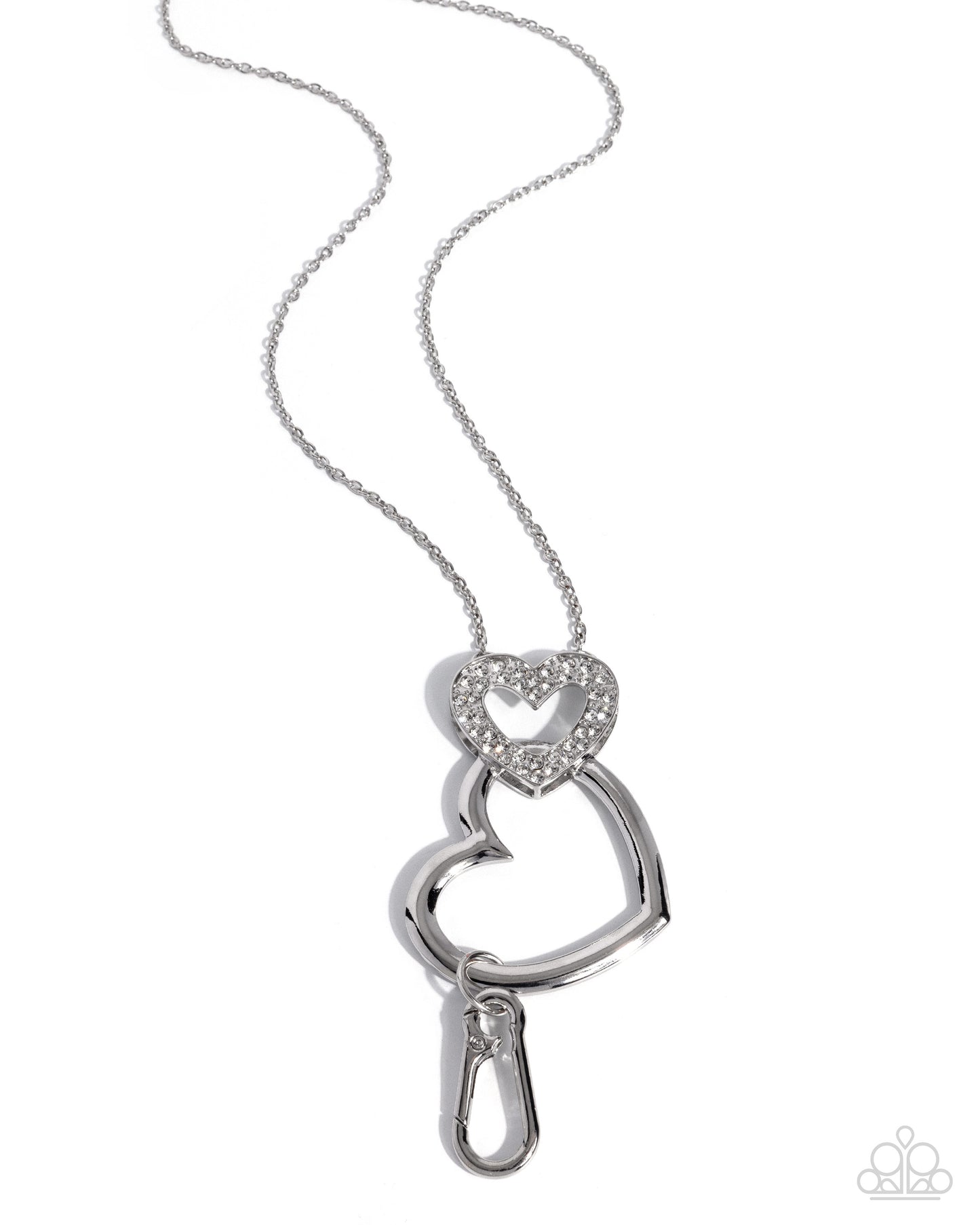 Silver necklace with a heart-shaped pendant on a white background