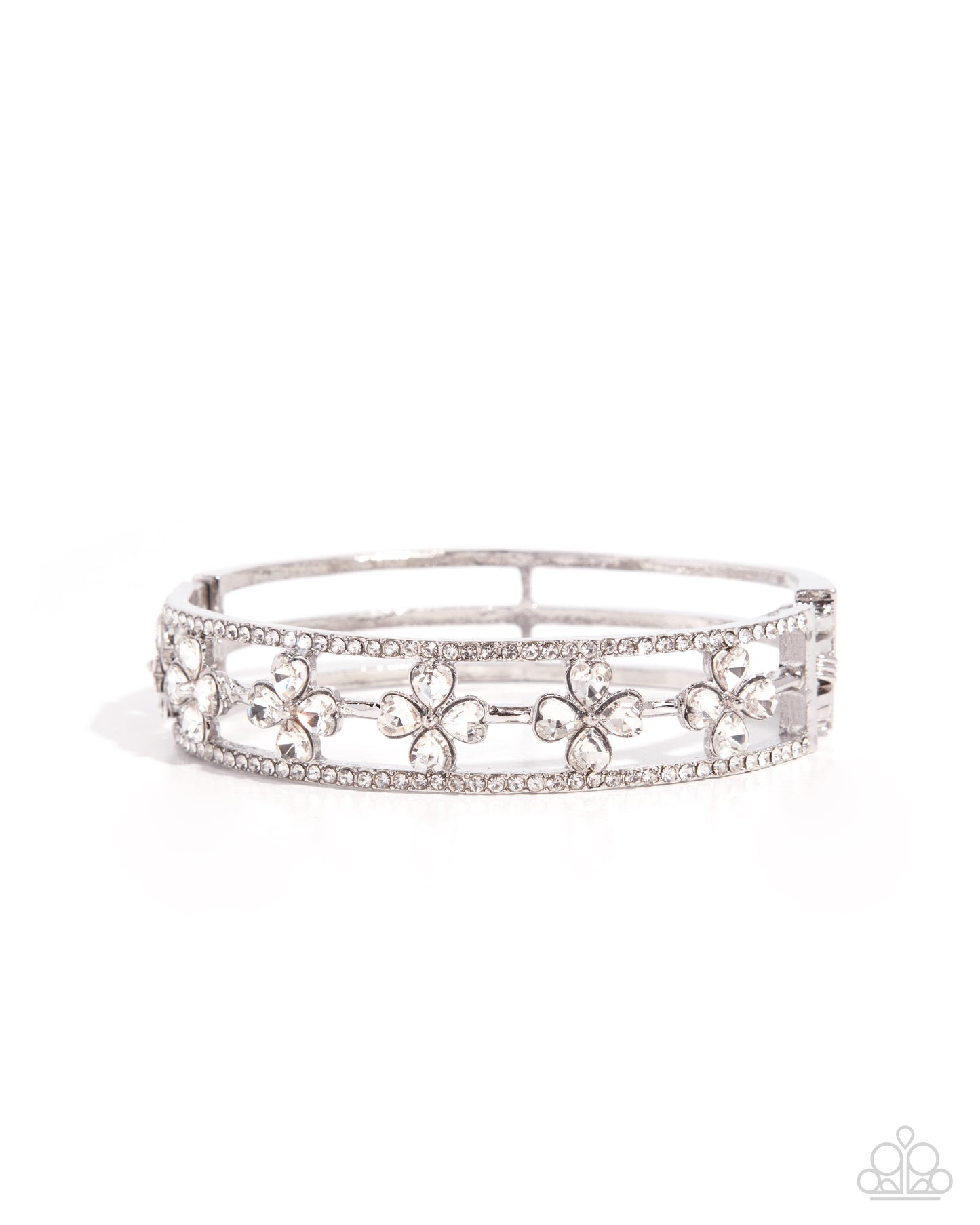 Silver tiara with floral designs on a white background
