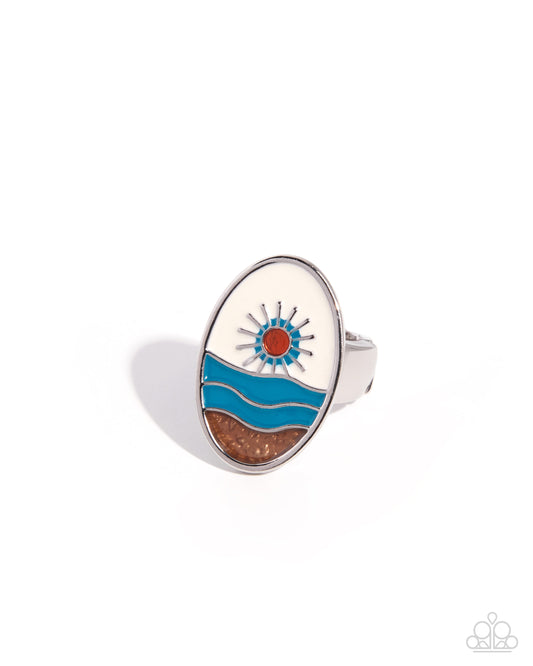 Ring with a sun and wave design on a white background