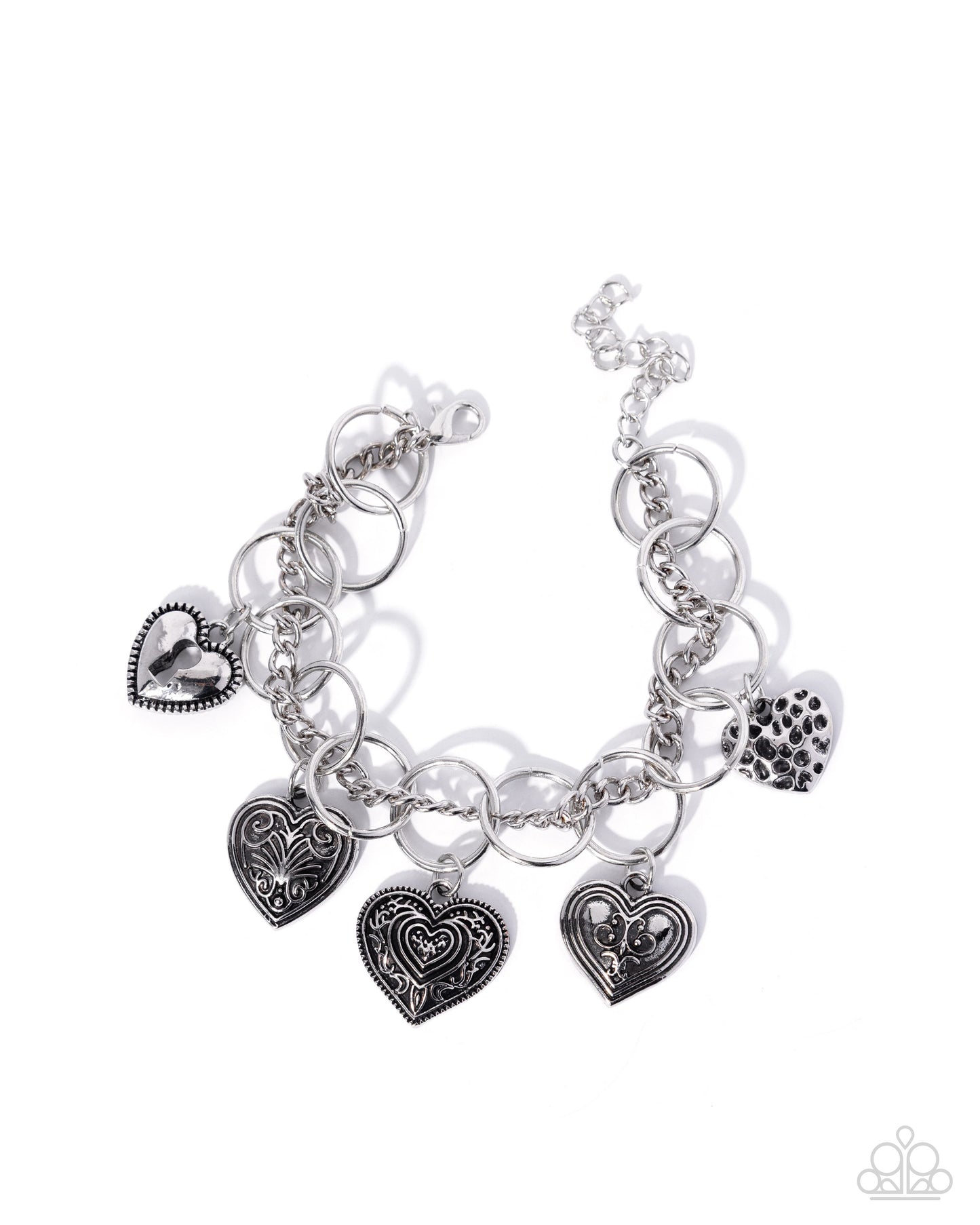 Silver charm bracelet with heart-shaped charms on a white background
