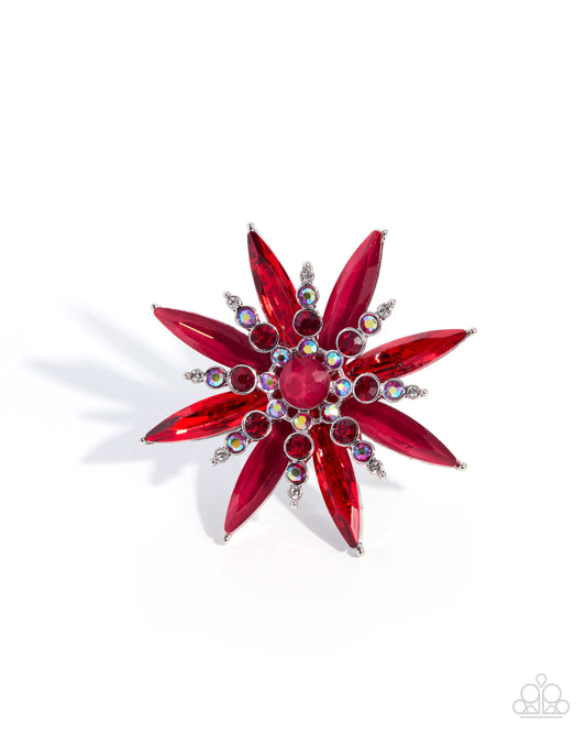 A red flower-shaped brooch featuring faceted red crystals and small silver-toned rhinestone accents, photographed on a clean white background.