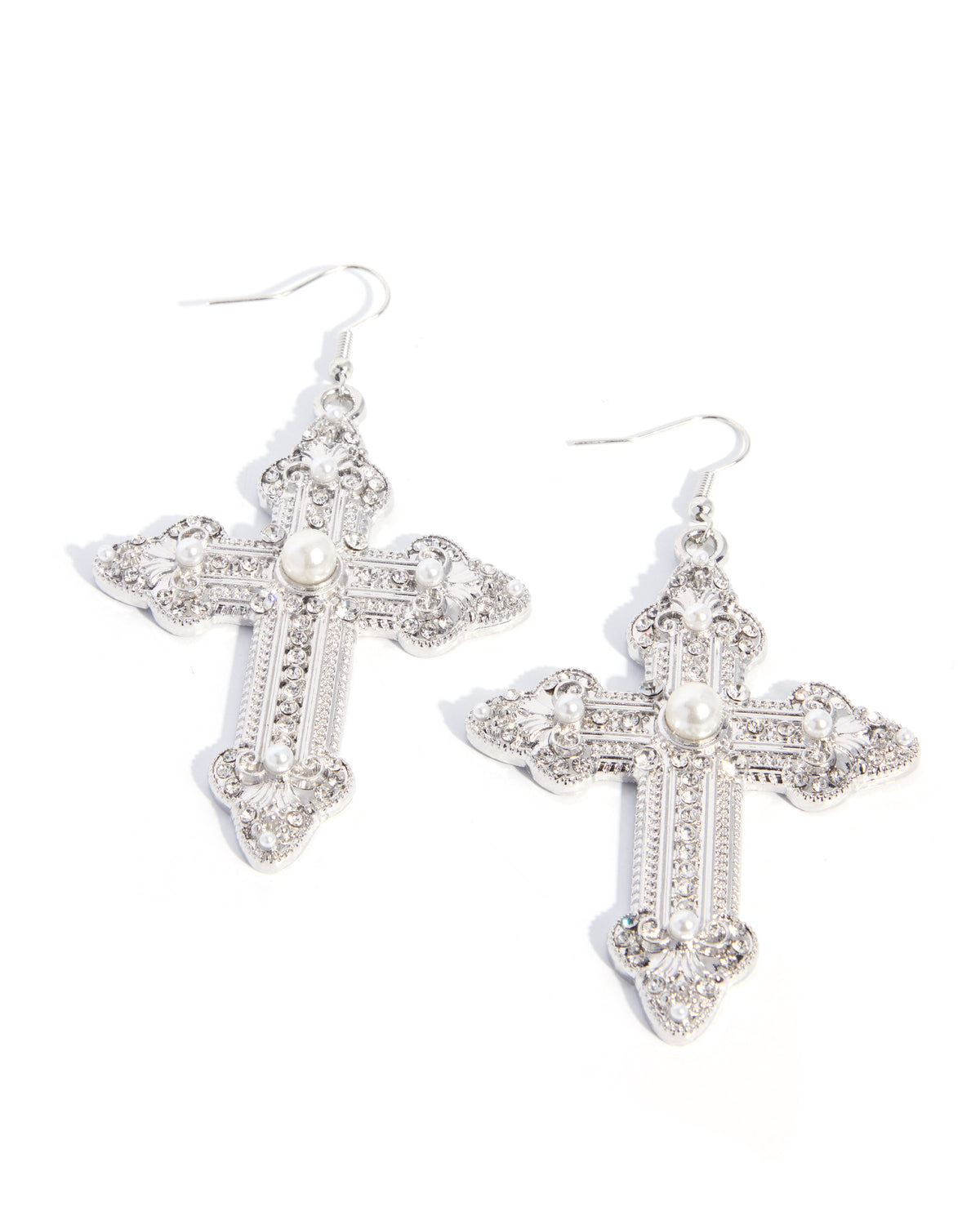 A pair of silver-toned cross dangle earrings embellished with clear rhinestones and a small white pearl at the center, shown on a plain white background.