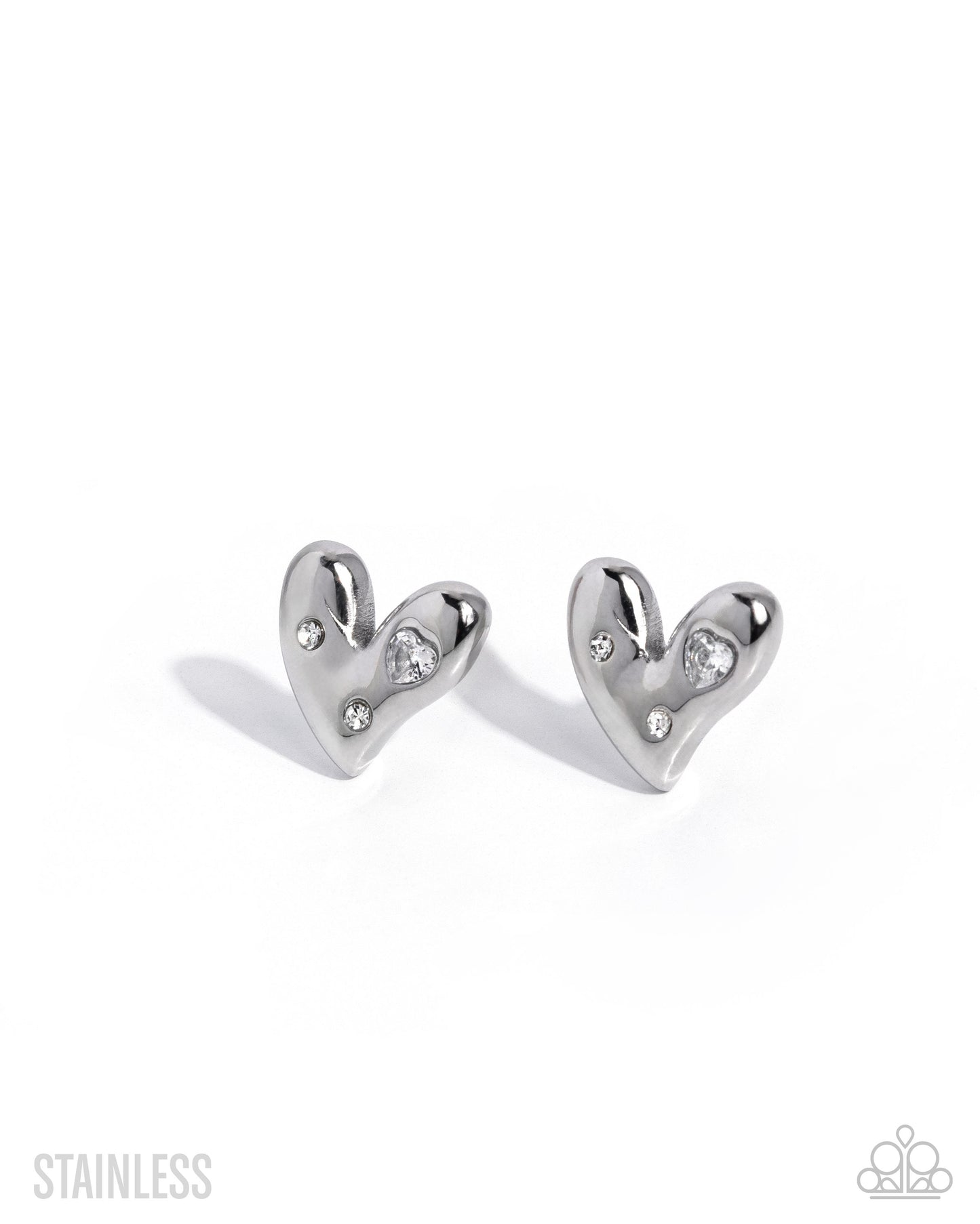A pair of polished stainless steel heart-shaped stud earrings with small clear crystal accents, shown on a clean white background with soft shadows.