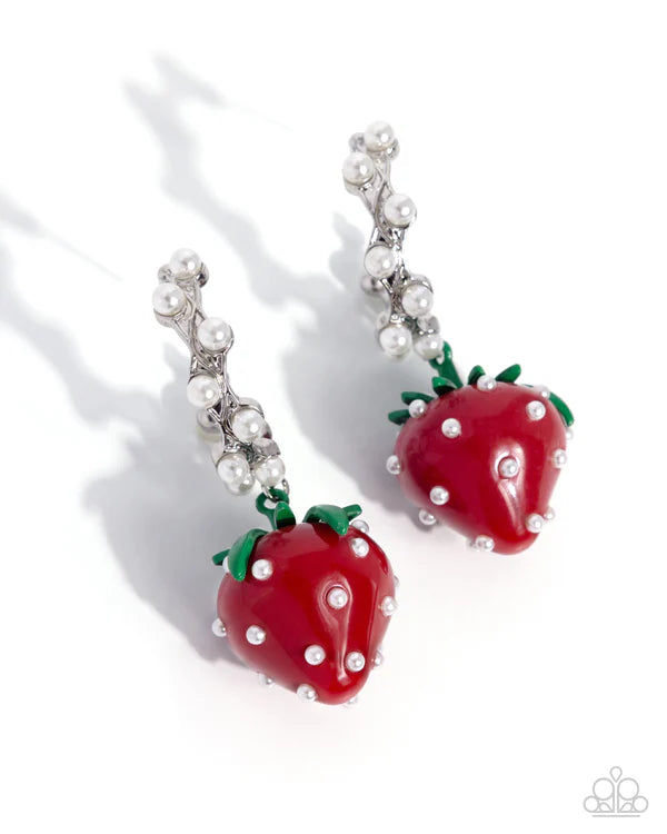 Strawberry-shaped earrings with pearl accents on a white background