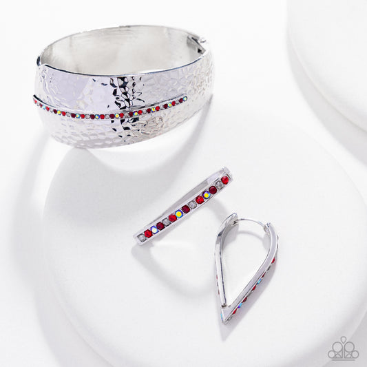 Silver bracelet with colorful stones on a white background