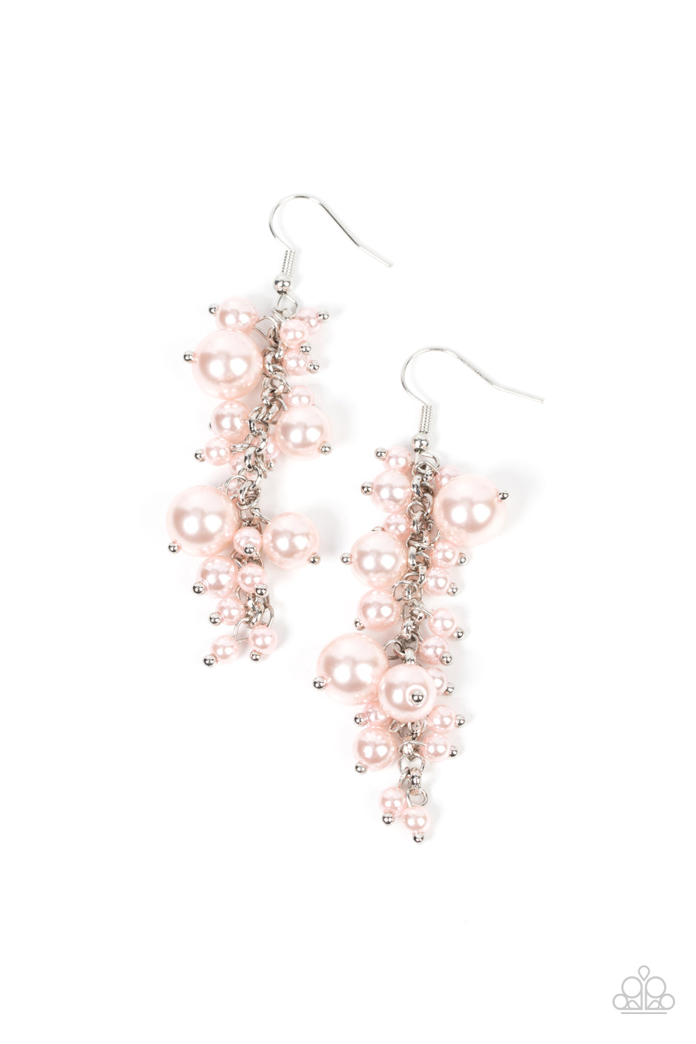 Pair of pink pearl earrings on a white background