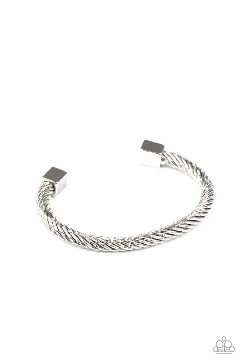 Silver cable bracelet on a white background