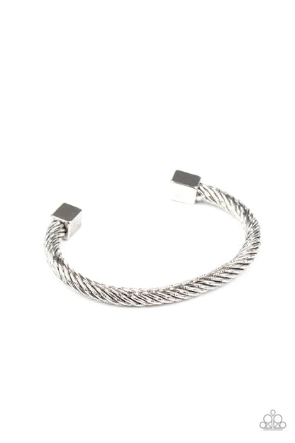 Silver cable bracelet on a white background