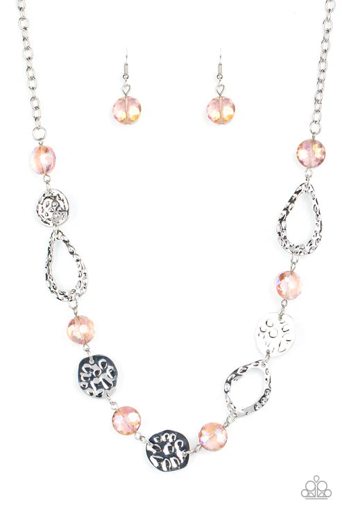 Necklace with pink beads and silver accents on a white background