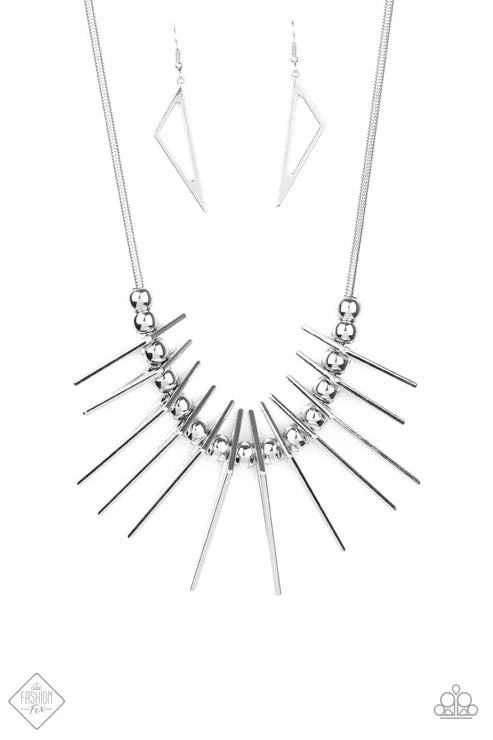 Silver necklace with geometric design on a white background