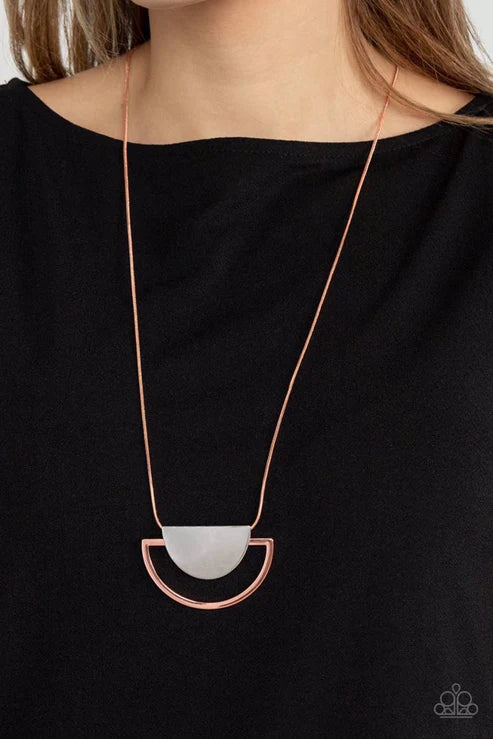Necklace with a half-circle pendant on a black background