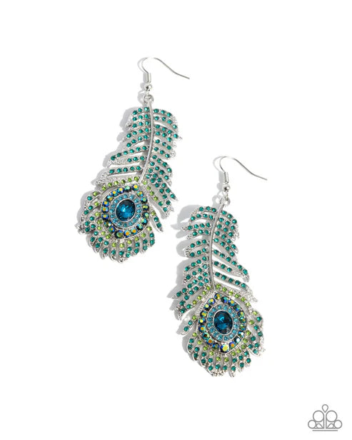 Pair of feather-shaped earrings with blue centers on a white background