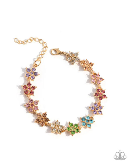 Multicolored floral bracelet on a white background