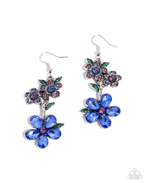 Pair of floral earrings with blue and purple flowers on a white background