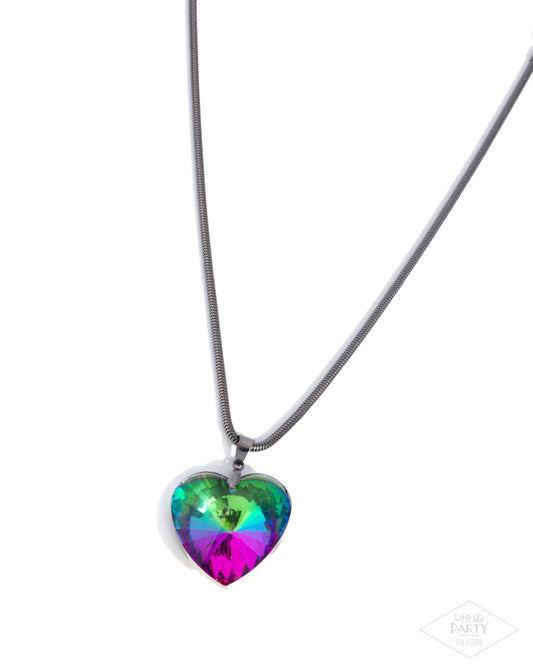 Necklace with a heart-shaped multicolored pendant on a white background