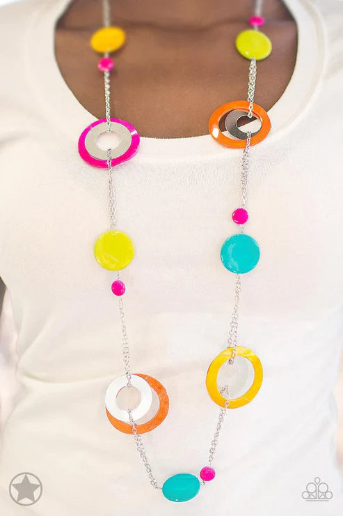 Colorful necklace with circular pendants on a white background