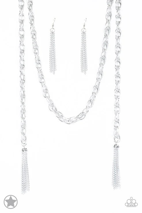 Silver chain necklace with tassels on a white background