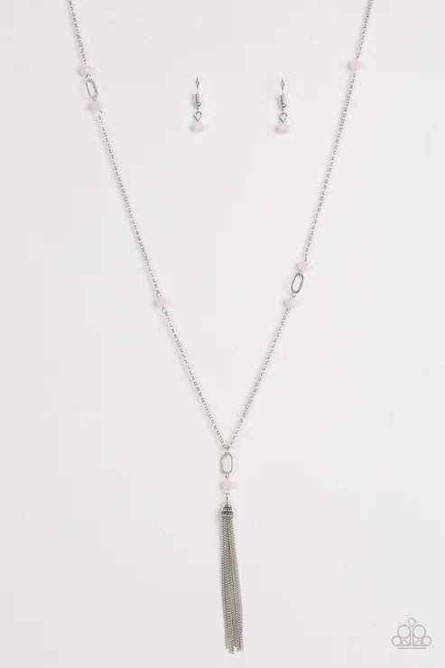 Necklace with tassel and matching earrings on a white background