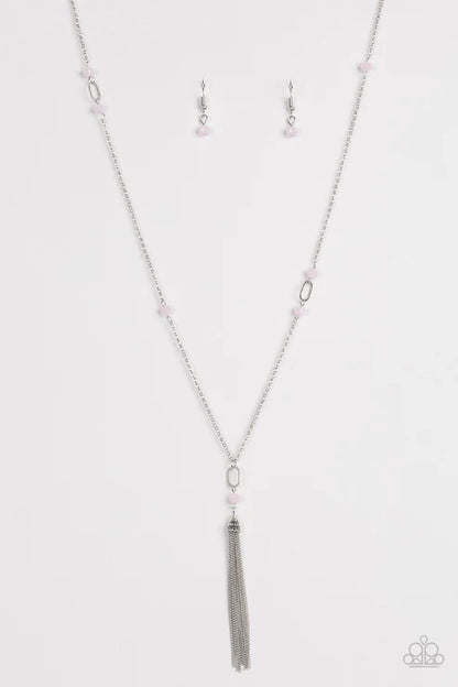 Necklace with tassel and matching earrings on a white background