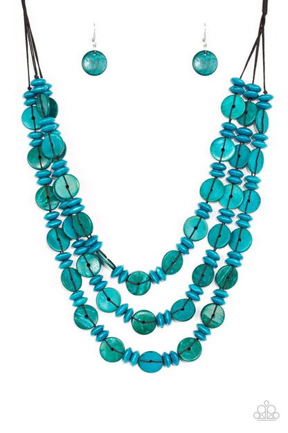 Turquoise beaded necklace and earrings on a white background