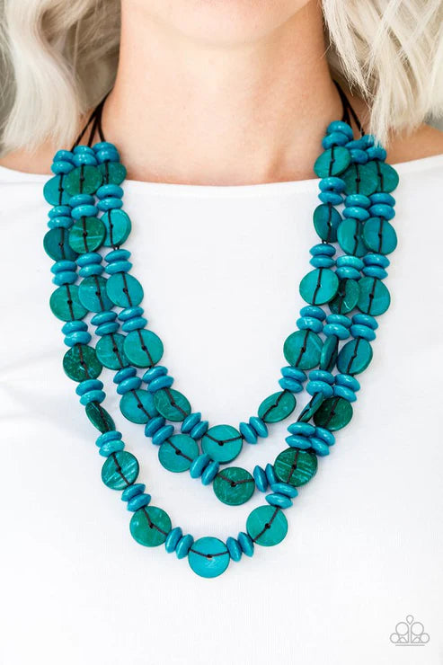 Turquoise beaded necklace on a white background