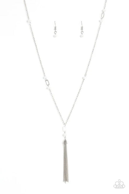 Silver tassel necklace on a white background