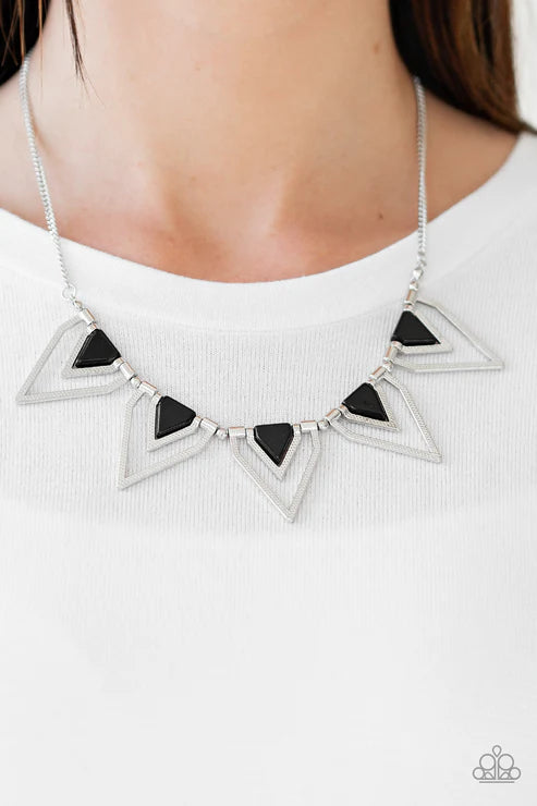 Necklace with black triangle pendants on a white background
