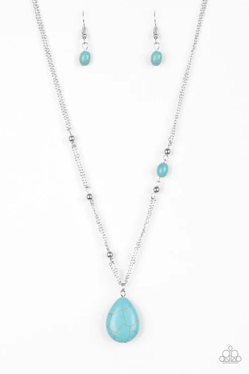 Turquoise teardrop necklace with matching earrings on a white background