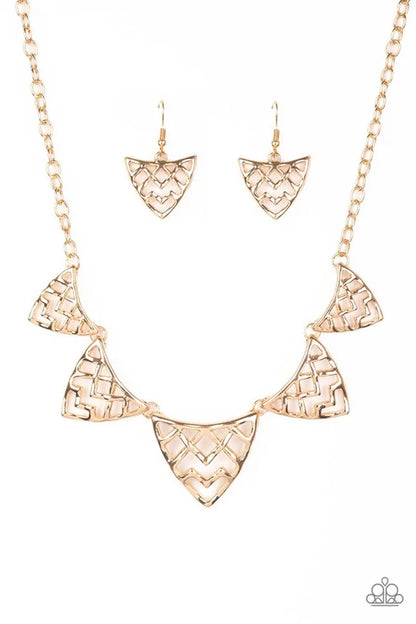 Rose gold necklace and earrings set on a white background