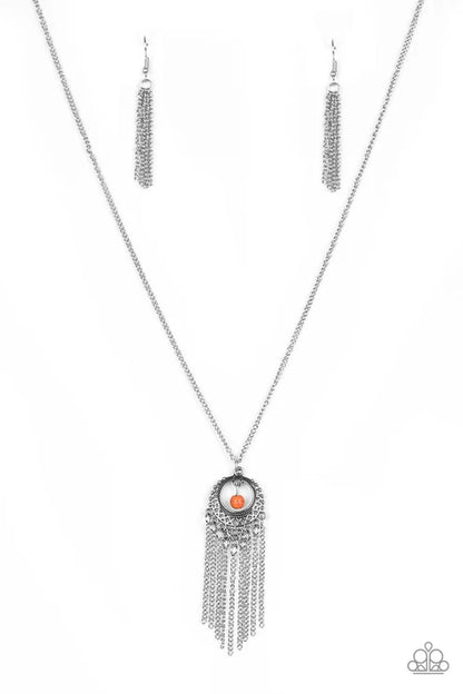 Necklace with fringe and central pendant on a white background