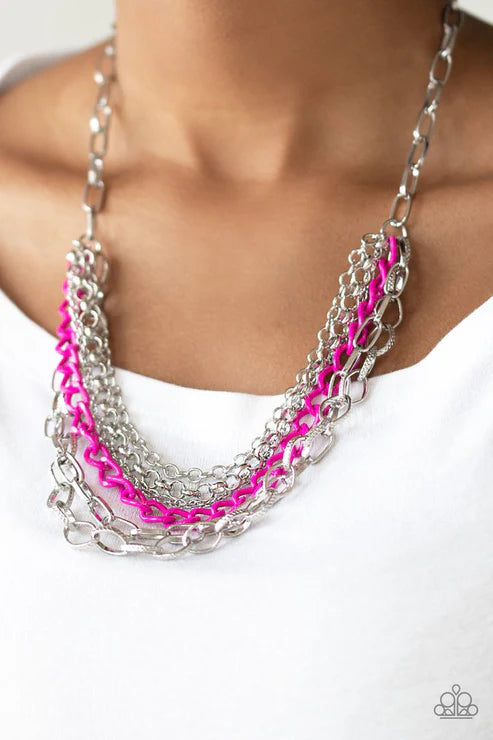 Necklace with pink and silver chains on a white background