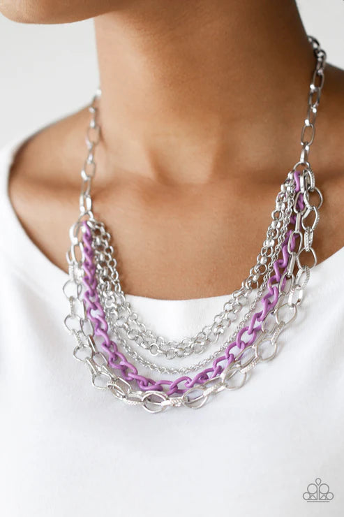 Necklace with silver and purple chains on a white background