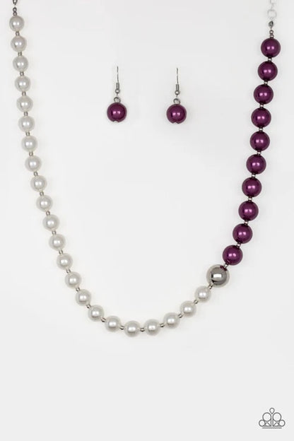 Pearl necklace with purple beads and matching earrings on a white background