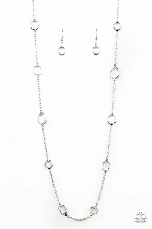 Silver necklace and earrings on a white background