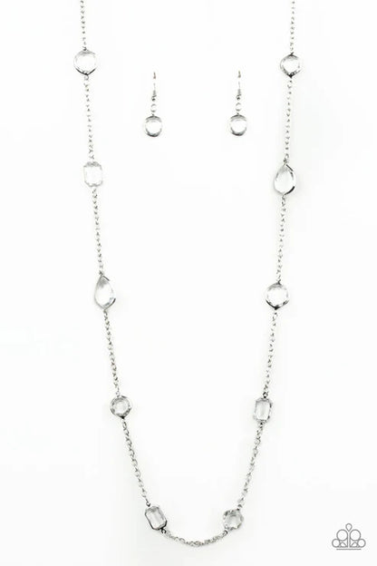 Silver necklace and earrings on a white background