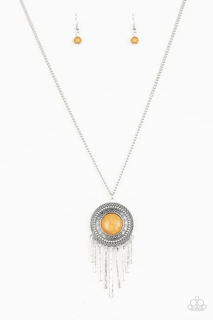 Necklace with pendant and matching earrings on a white background
