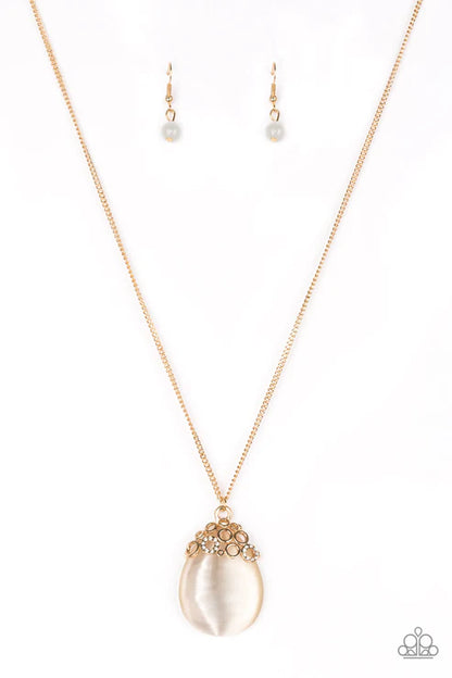 Necklace and earrings set with pearl-like pendant on a white background
