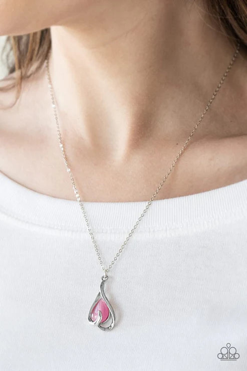 Necklace with a pink teardrop pendant on a white background