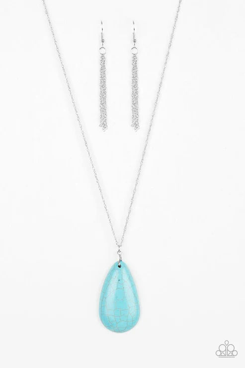 Turquoise teardrop pendant necklace with matching earrings on a white background