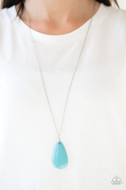Turquoise teardrop pendant necklace on a white background