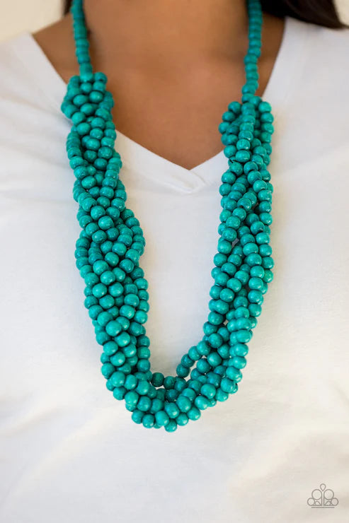 Turquoise beaded necklace on a white background