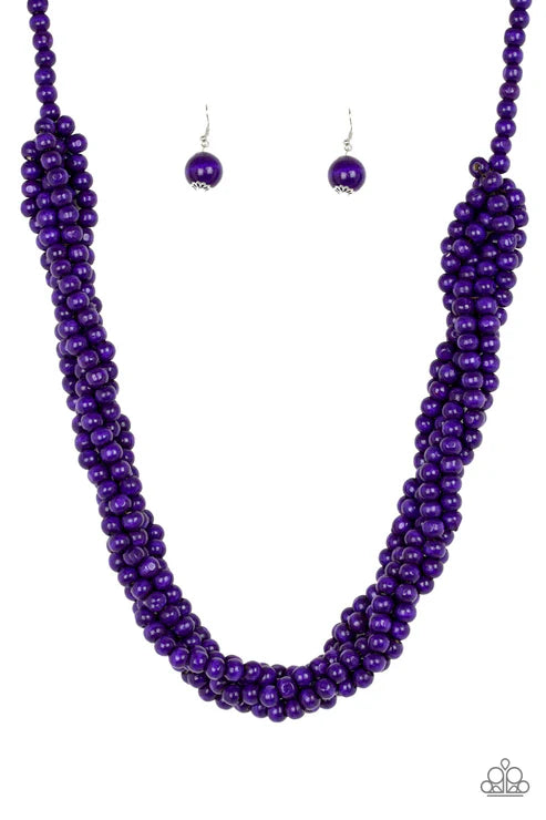 Purple beaded necklace and earrings on a white background
